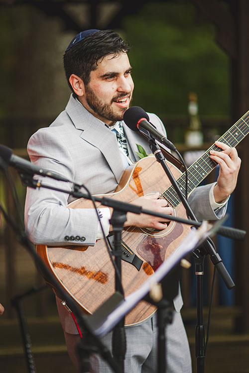 Eitan-playing-guitar