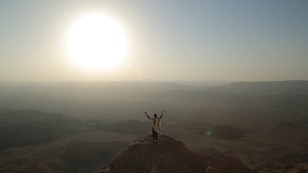 Rabbi Shulman davening at the Mitzpe Ramon crater in 2013